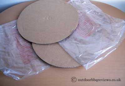 circular cardboard and clear plastic bags